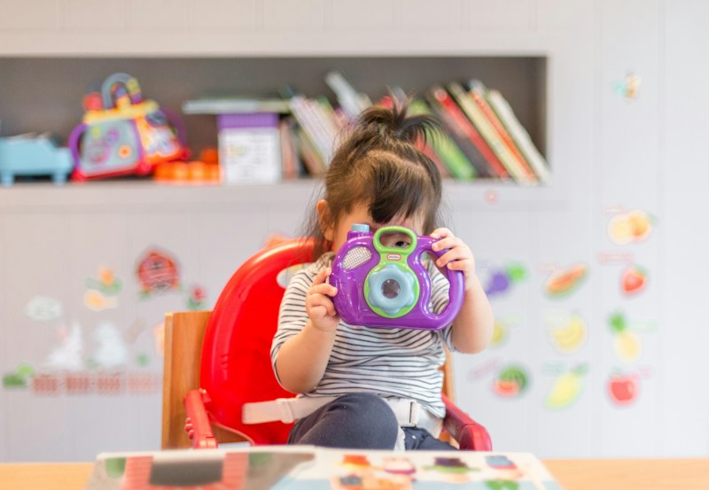 An adolescent engaging in creative self-expression during a therapy session